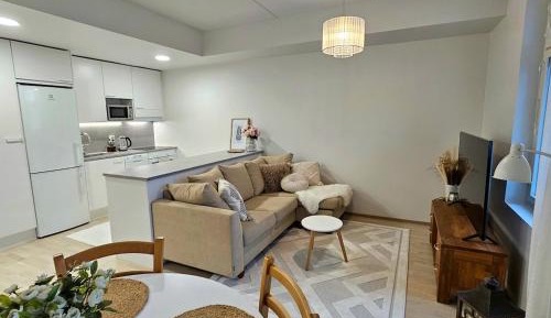 One-Bedroom Apartment with Balcony and City View