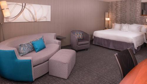 King Room with Sofa Bed and Roll-in Shower - Mobility and Hearing Accessible