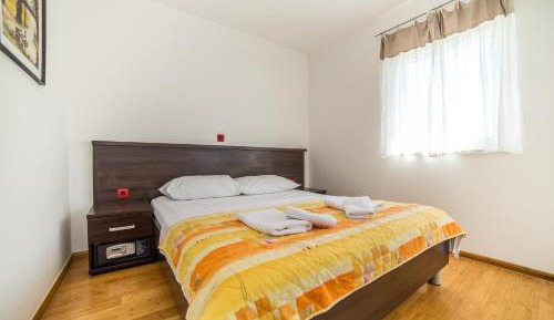 Two-Bedroom Apartment with Balcony
