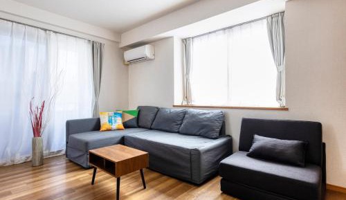 One-Bedroom Apartment with Balcony and City View