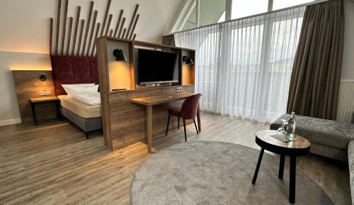 Junior Suite with City View and Balcony 
