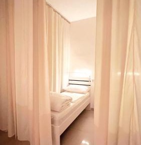 Single Bed in Female Dormitory Room
