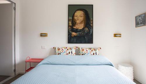 One-Bedroom Apartment with Balcony and City View