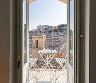 One-Bedroom Apartment with Balcony and City View