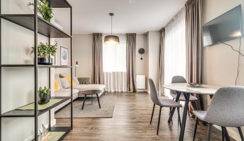 One-Bedroom Apartment with Balcony and City View