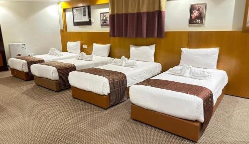 Quadruple Room with Private Bathroom