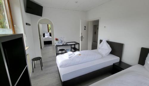 Quadruple Room with Private Bathroom