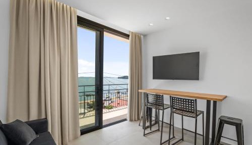 Two-Bedroom Apartment with Balcony and Sea View