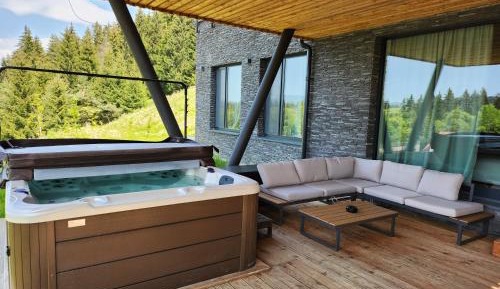 Four-Bedroom Chalet with Jacuzzi