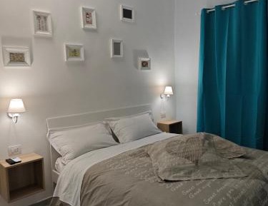 Quadruple Room with Private Bathroom