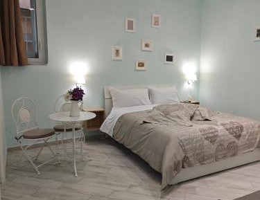 Quadruple Room with Private Bathroom