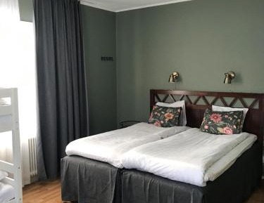 Quadruple Room with Shared Bathroom