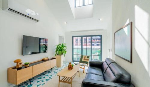 One-Bedroom Apartment with Balcony and City View
