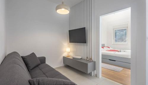 One-Bedroom Apartment with Balcony and Sea View
