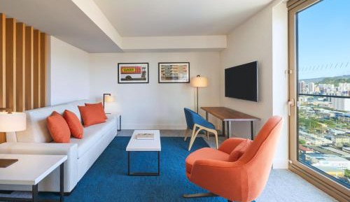 One-Bedroom King Suite with Sofa Bed and Partial Ocean View