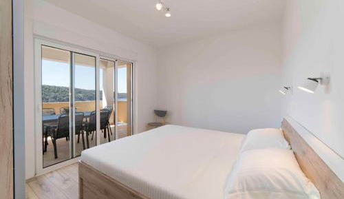 Two-Bedroom Apartment with Balcony and Sea View