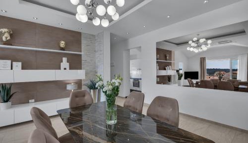 Three-Bedroom Apartment with Terrace and Sea View