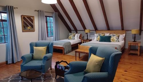 Upstairs Superior Triple sleeper with spacious sitting area