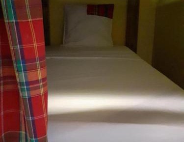 Single Bed in Female Dormitory Room
