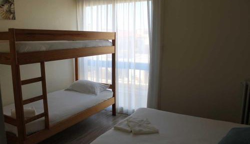 Quadruple Room (2 Adults + 2 Children)