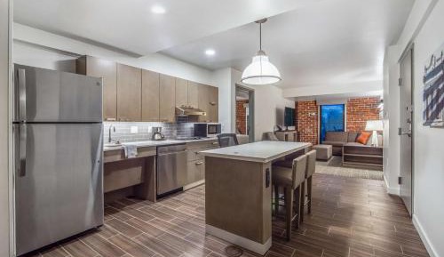 One-Bedroom King Suite with Kitchen and Roll-In Shower - Disability Access