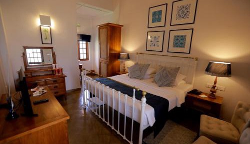 Deluxe Double Room + Early check-in/Late check-out on availability + FREE DROP off at Railway Station + 20% discount on Adisham Bungalow Excursion