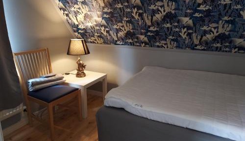 Quadruple Room with Shared Bathroom