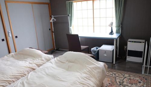 Standard Twin Room with Shared Bathroom