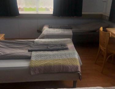 Basic Triple Room with Shared Bathroom