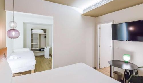 Superior Room with One Queen Bed and One Single Bed