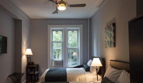 Standard Quadruple Room with Shared Bathroom