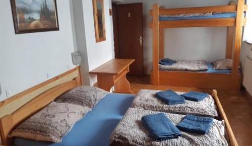 Quadruple Room with Private Bathroom