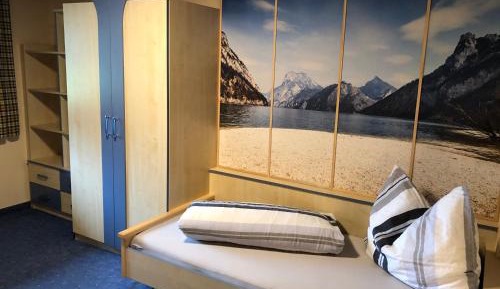 Four-Bedroom Apartment with Balcony 