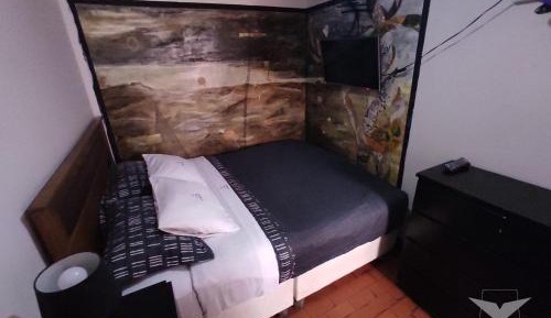 Queen Room with Shared Bathroom
