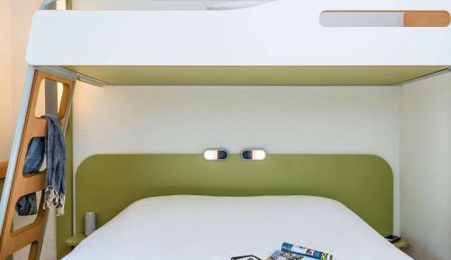 Room with One Queen Bed and One Bunk Bed