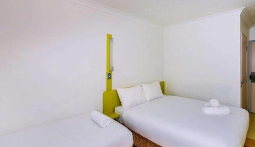Standard Room with One Queen Bed and One Single Bed