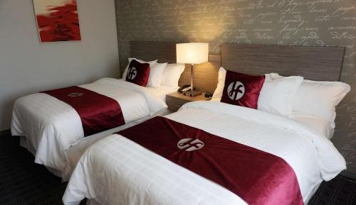 Two-Bedroom Suite with King and Two Double Beds