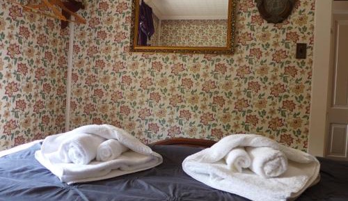 Queen Room with Shared Bathroom