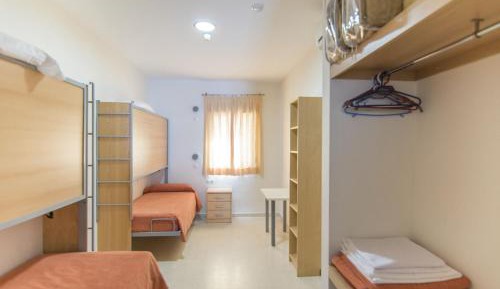 Single Bed in Dormitory Room