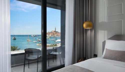 Superior Triple Room with Balcony and Sea View