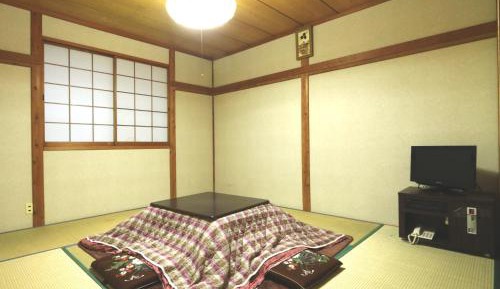 Quadruple Room with Shared Bathroom