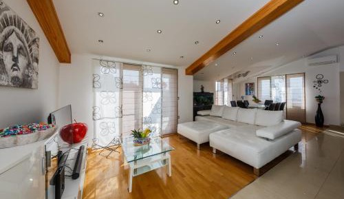 Four-Bedroom Apartment with Sea View