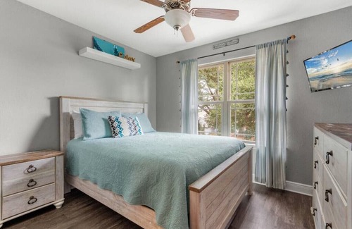 Sunset Bayou House | Beachy Blue House, 5 minutes to beach, with private hot tub, 3 bedrms/2.5 baths