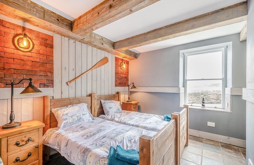 Dunure Cottage | The Harbour Nook is a gorgeous ground floor, coastal apartment situated at the harbour’s edge with l