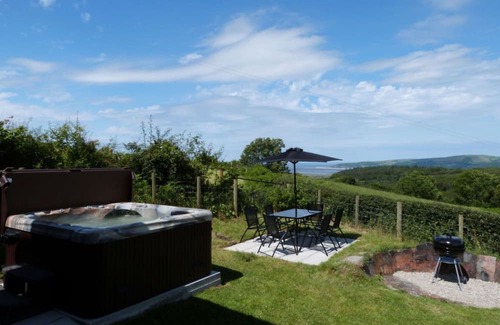 Machynlleth House | Beautiful private villa with WIFI, hot tub, TV, patio, pets allowed, panoramic view and parking