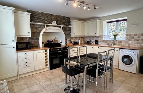 Port Erin Cottage | Beautiful cottage opposite Port Erin bay. Garden above beach. Fabulous sunsets!