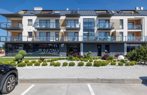 Sarbinowo Apartment | Blue and Yellow Apartment by Renters