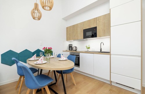 Sarbinowo Apartment | Blue and Yellow Apartment by Renters