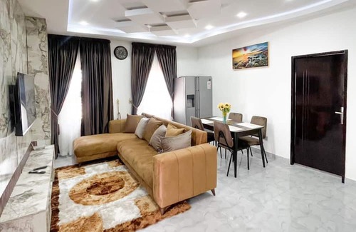 Teshie Apartment | 2 bedroom furnished appartment with a roof top bar for relaxation.