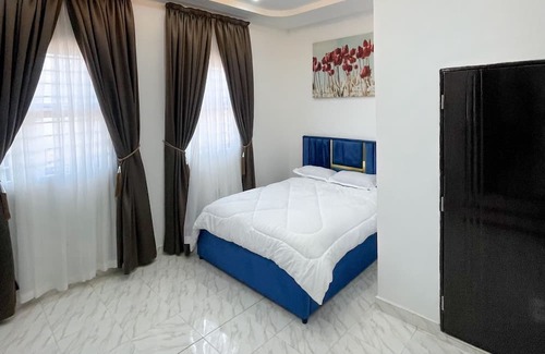 Teshie Apartment | 2 bedroom furnished appartment with a roof top bar for relaxation.